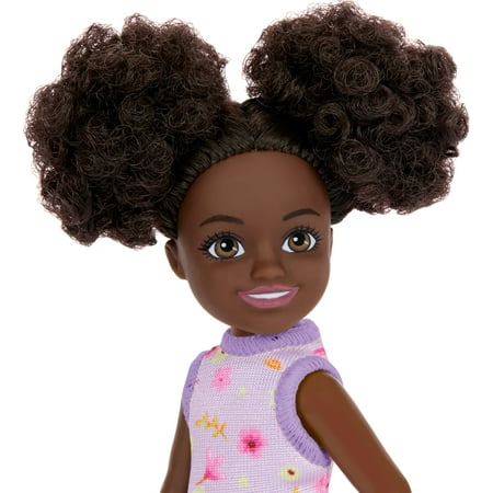 Barbie Chelsea Doll, Small Doll Wearing Removable Purple Floral Dress with Space Buns & Brown Eyes